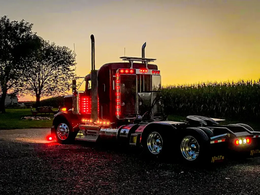 Angled Face Stainless Steel Enclosed Headache Rack on a Semi Truck