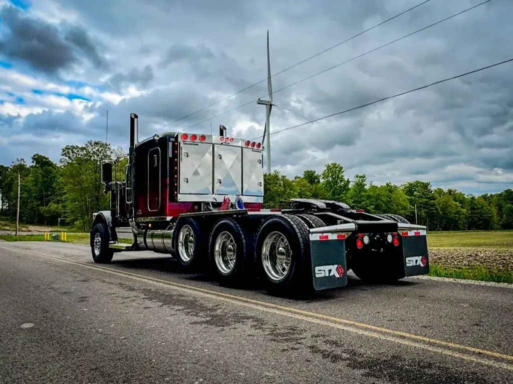 Angled Face Stainless Steel Enclosed Headache Rack on a Semi Truck