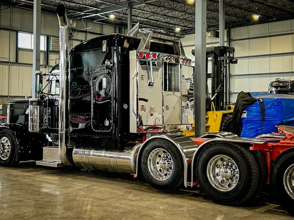 Angled Face Stainless Steel Enclosed Headache Rack on a Semi Truck
