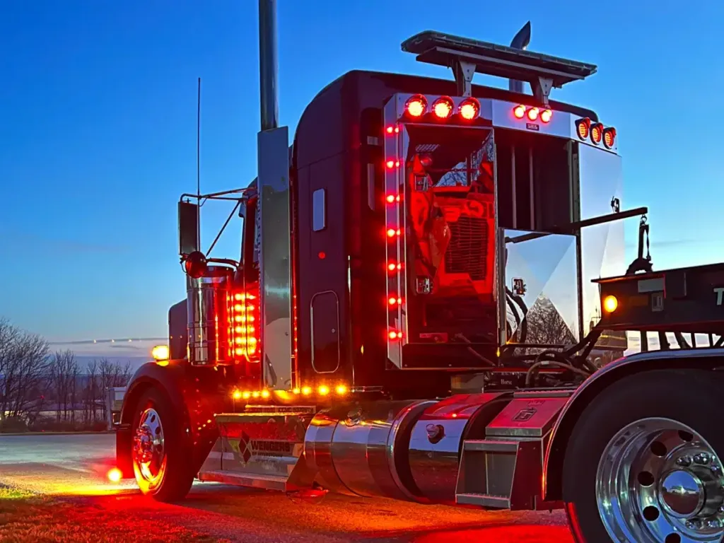 Angled Face Stainless Steel Enclosed Headache Rack on a Semi Truck
