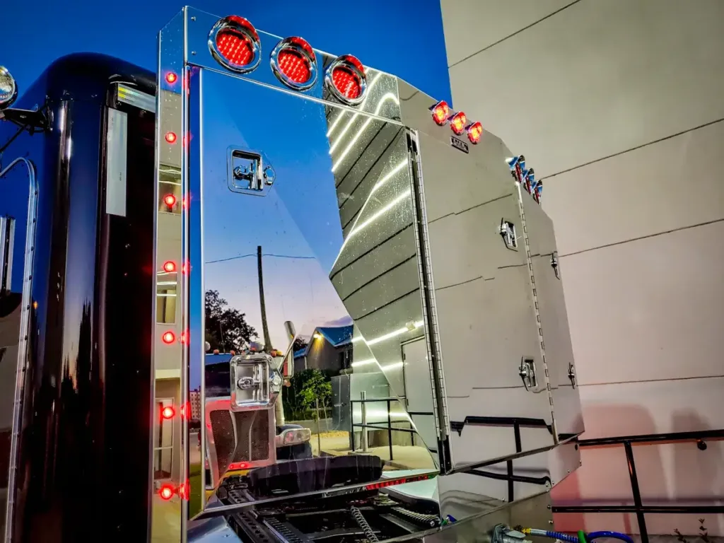Angled Face Stainless Steel Enclosed Headache Rack on a Semi Truck