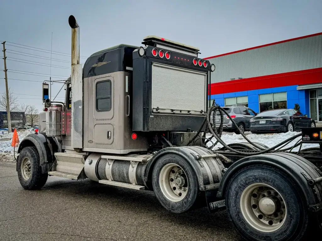 Roll-Up Door Enclosed Headache Rack on a Semi Truck