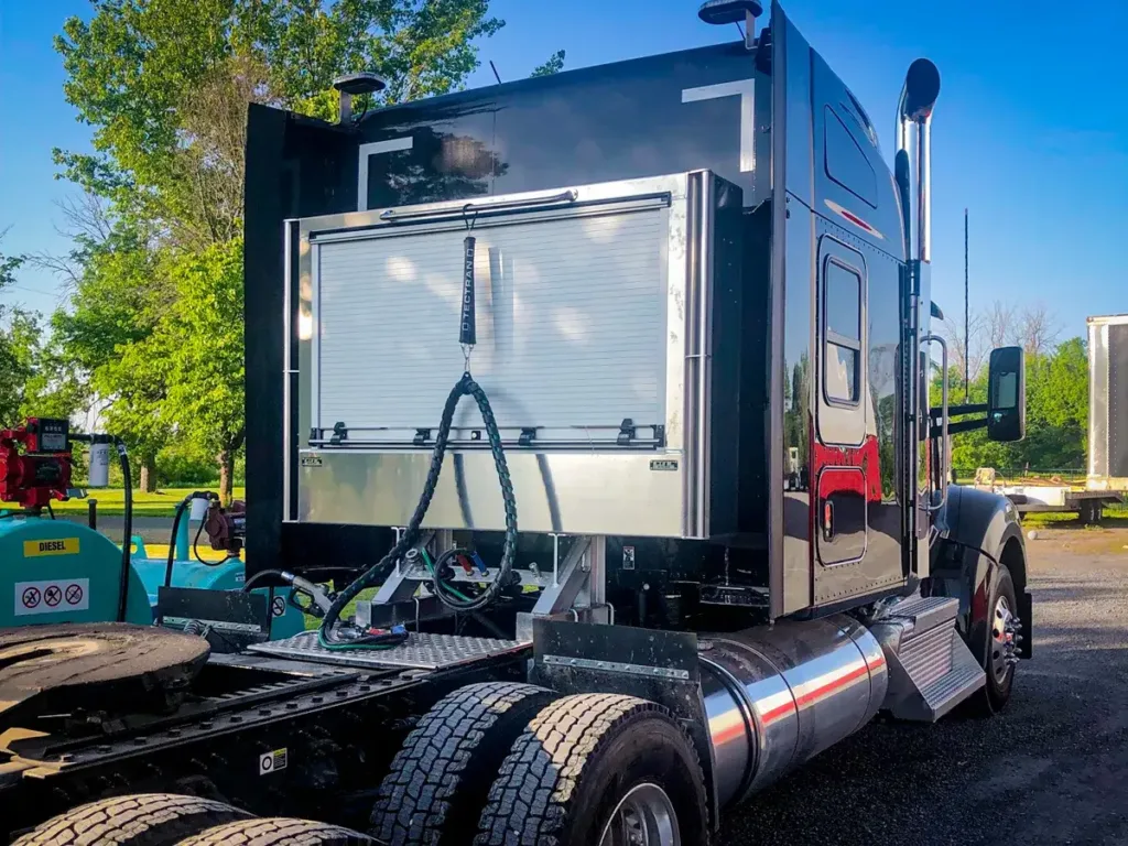 Roll-Up Door Enclosed Headache Rack on a Semi Truck