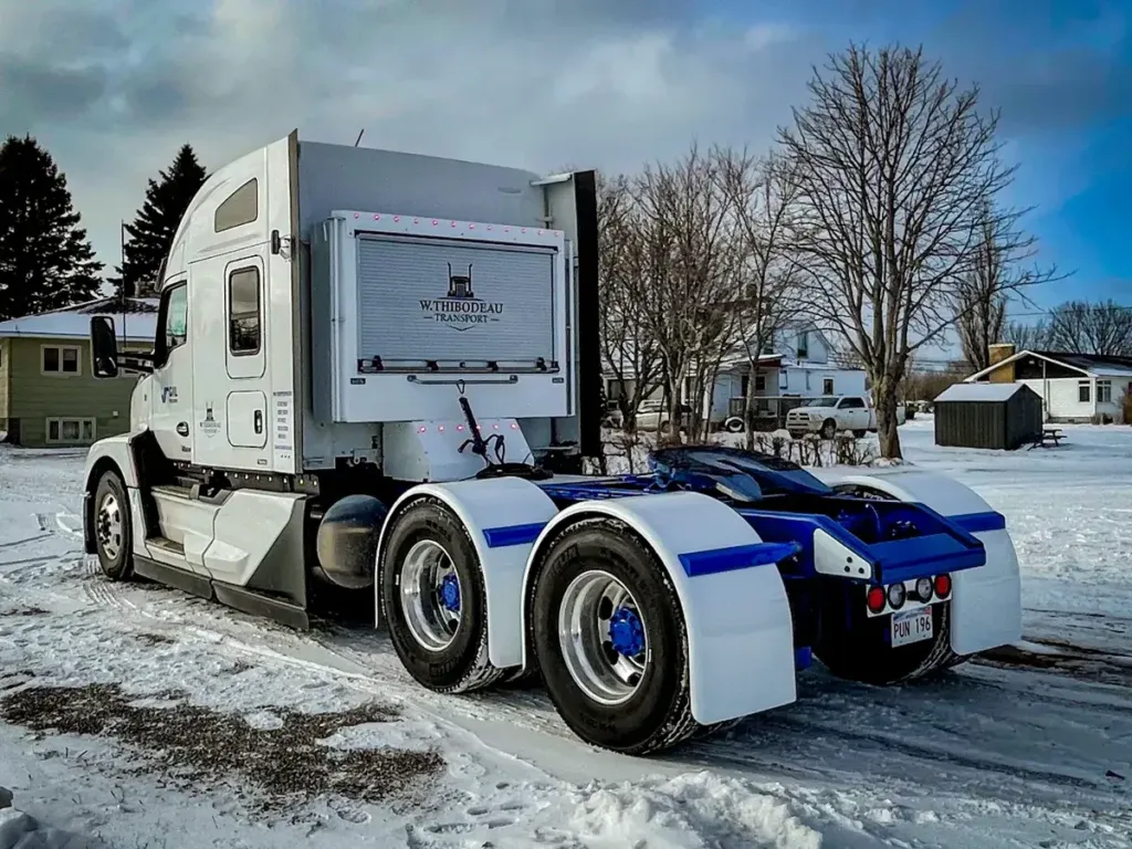 Roll-Up Door Enclosed Headache Rack on a Semi Truck