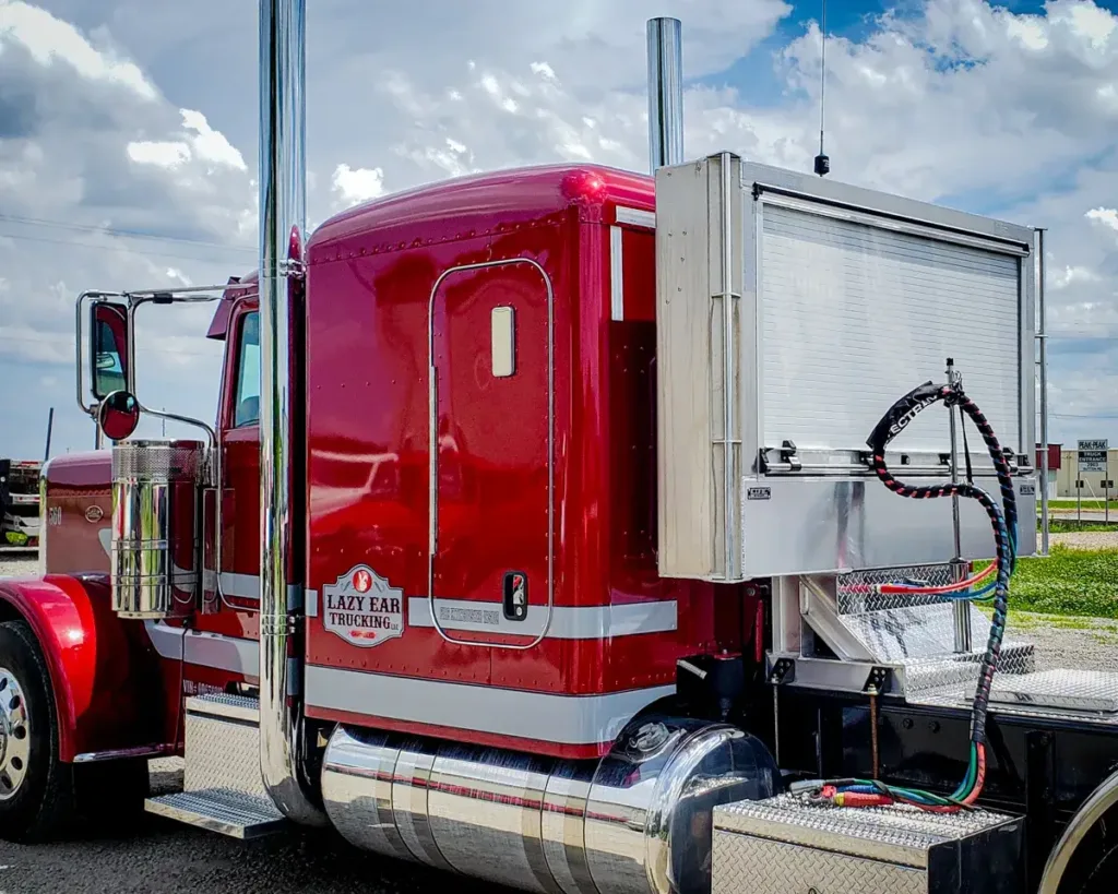 Roll-Up Door Enclosed Headache Rack on a Semi Truck