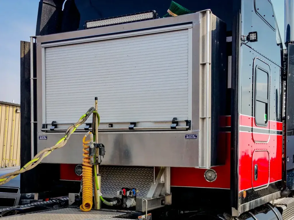 Roll-Up Door Enclosed Headache Rack on a Semi Truck
